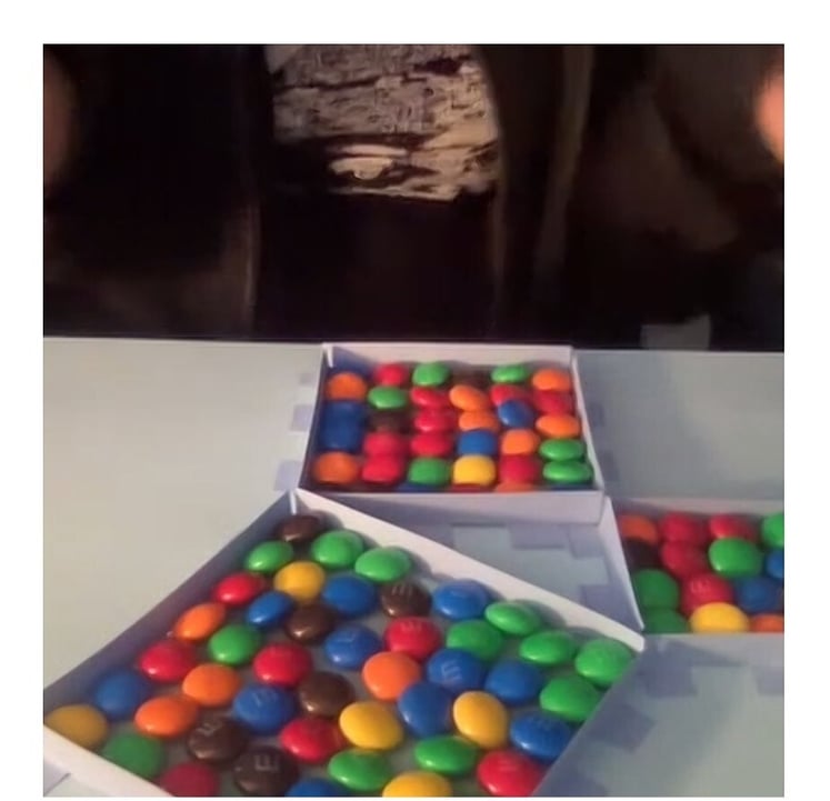 image of 3 square areas, filled with m&ms